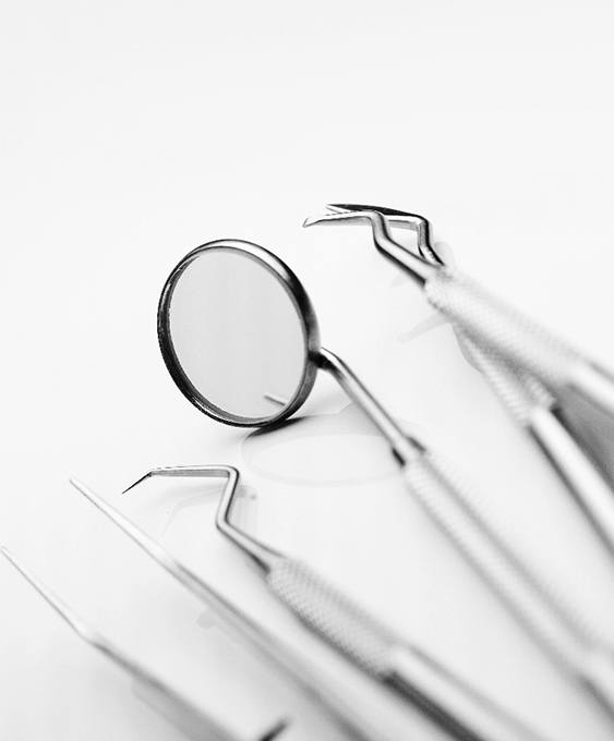 A tooth on a grass background