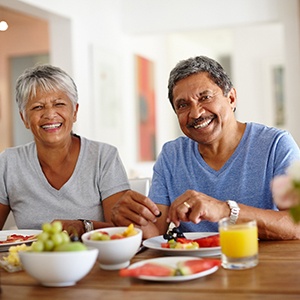 Man and woman sharing a healthy lunch
